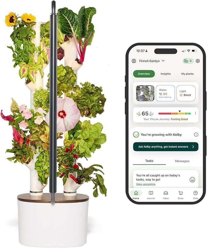 Gardyn Home Kit 3.0 hydroponic growing system filled with herbs and greens